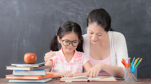 Image featuring a dedicated Filipina tutor in Qatar providing personalized educational support to a student